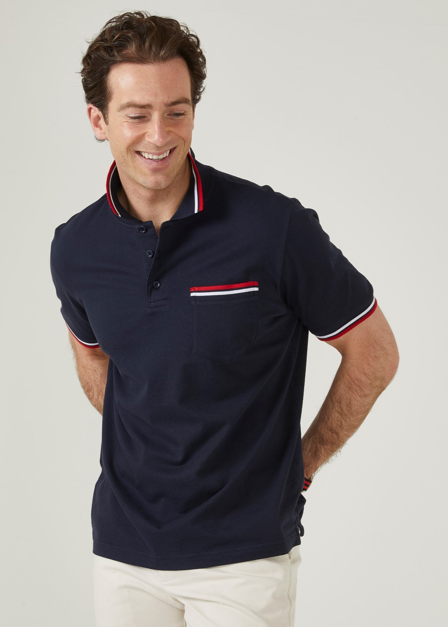short sleeved pique polo shirt with trim in navy.