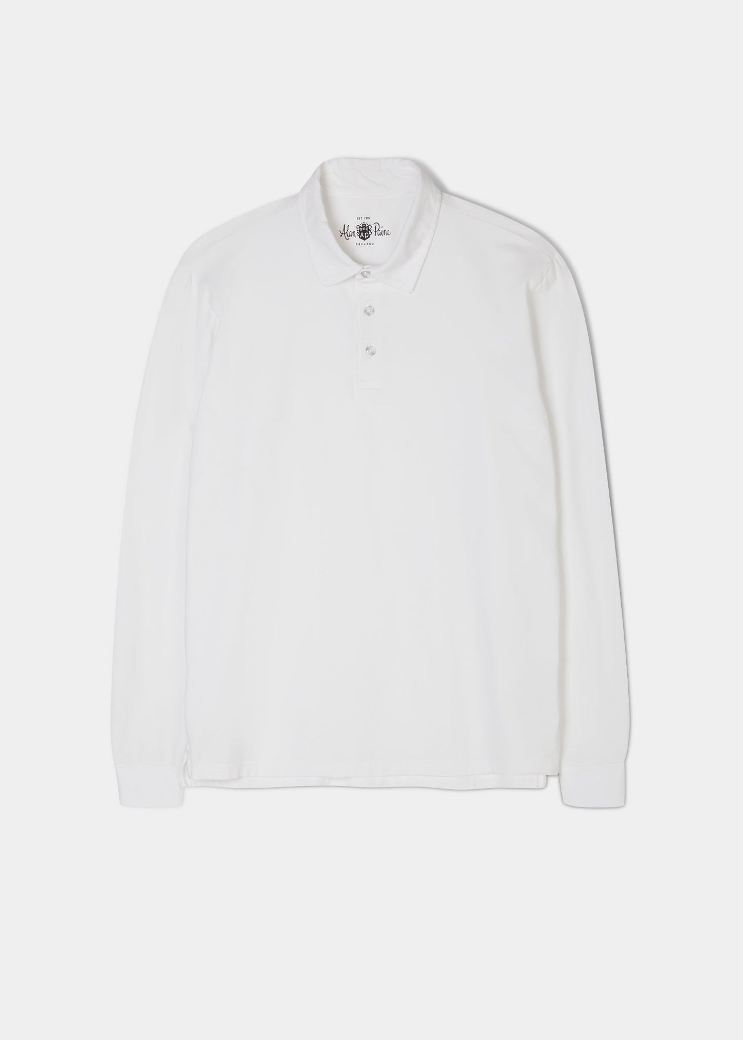Faded dye polo shirt in white made from a cotton/ spandex blend.