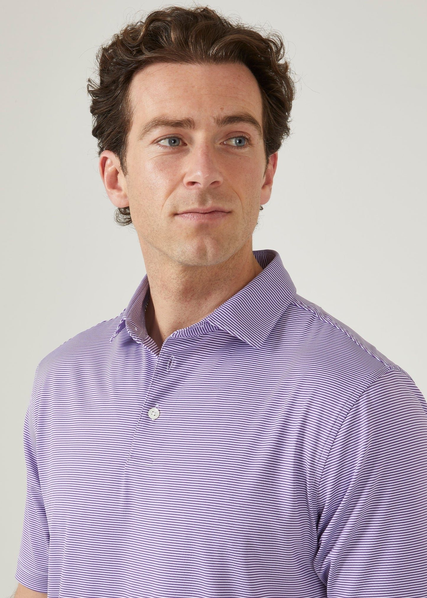 Polo shirt made from polyester with 3 button collar in plum with white stipes.