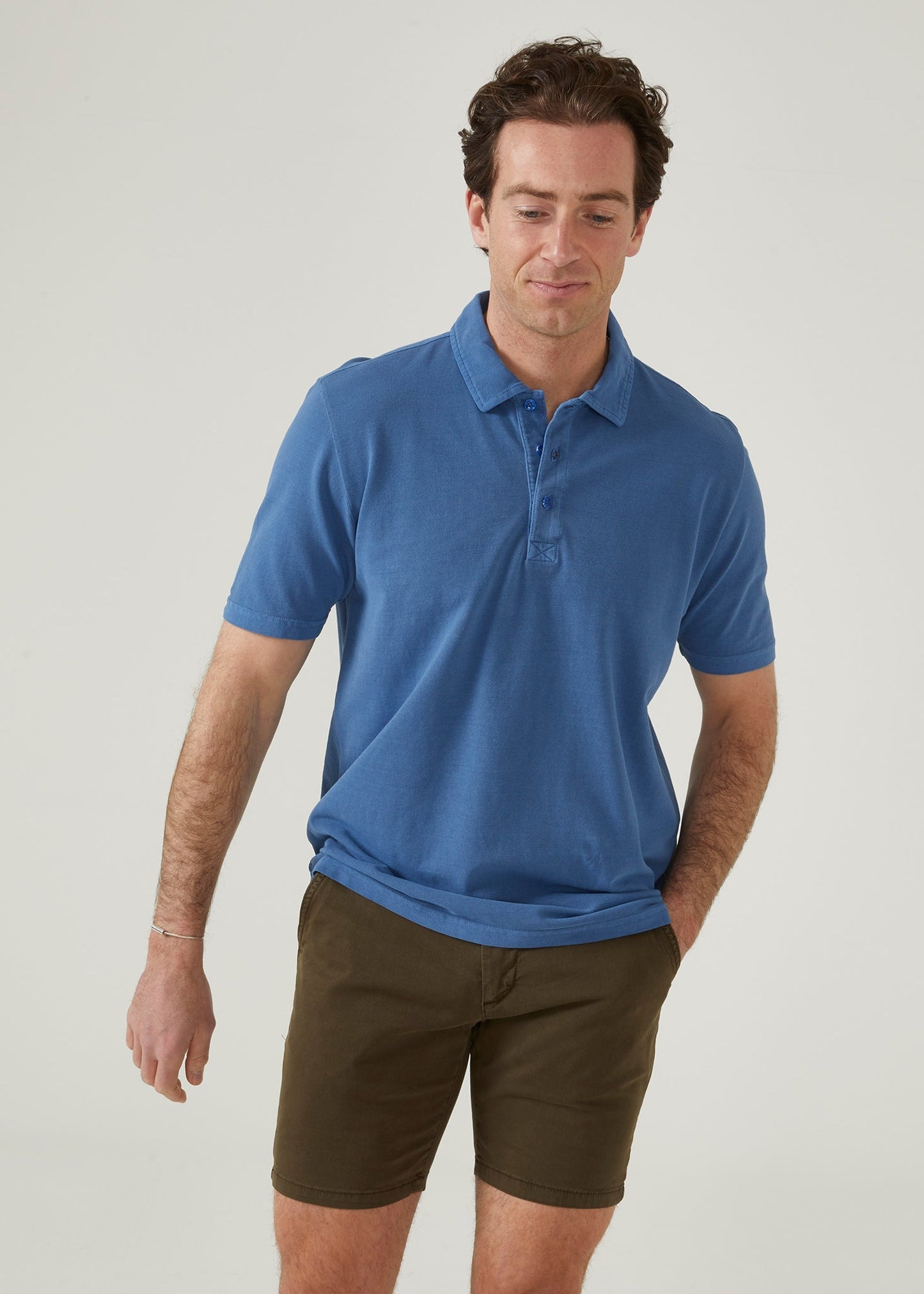 peruvian cotton short sleeve polo shirt in regatta blue.